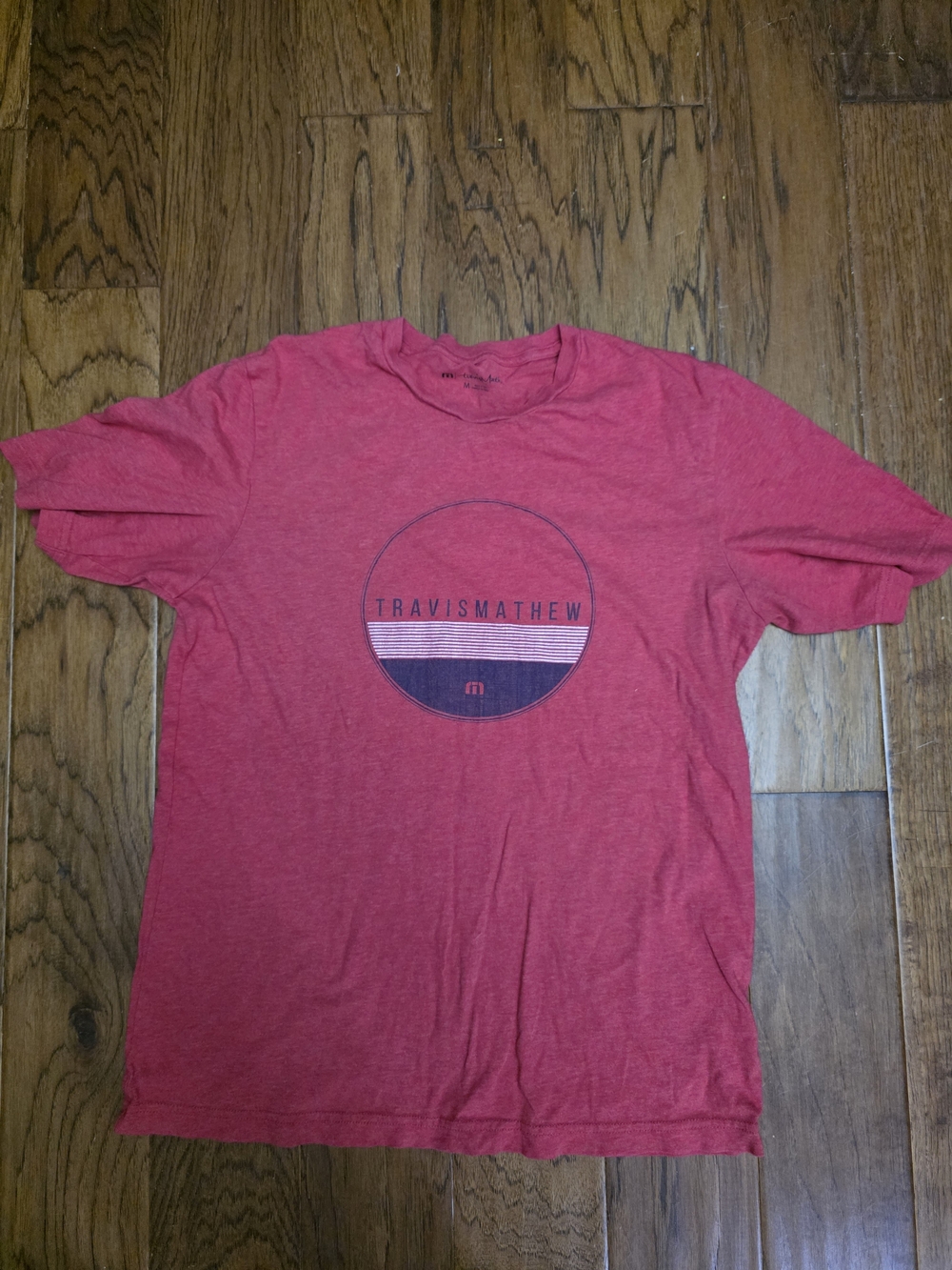 Travis Mathew Heather Red Short Sleeve Crewneck Tee with Chest Logo